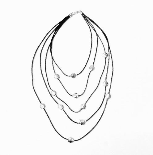 MULTI ROW SMALL SILVER ROUND DISCS ON BLACK LEATHER CORD