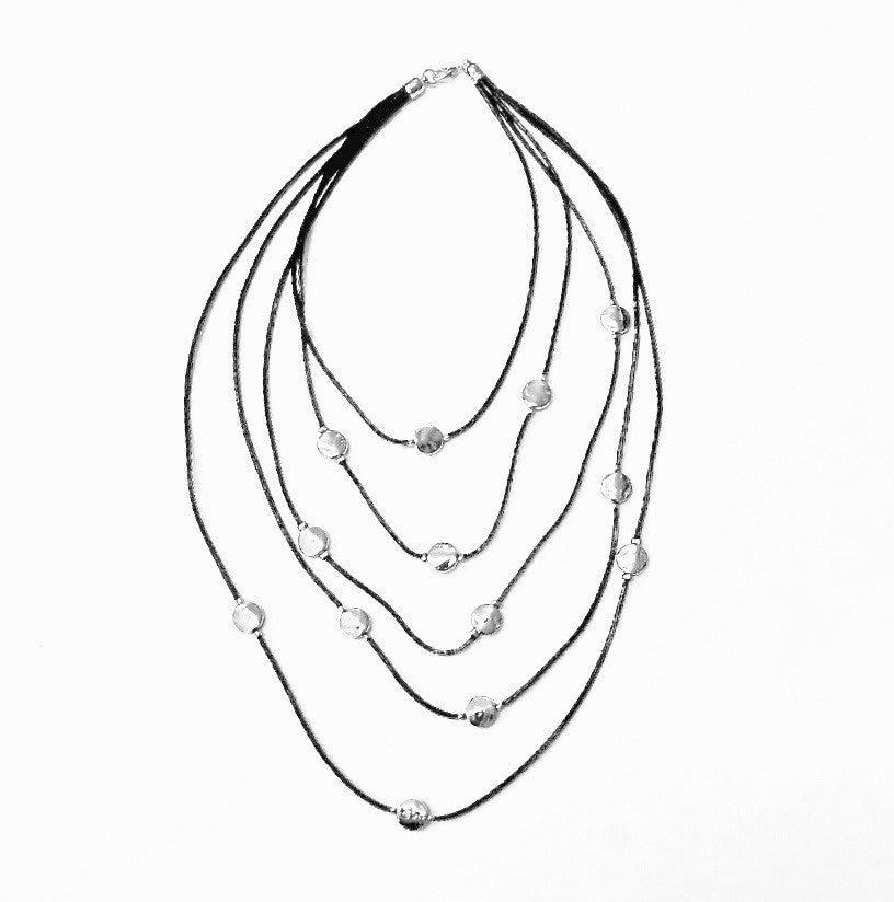 MULTI ROW SMALL SILVER ROUND DISCS ON BLACK LEATHER CORD